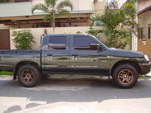 2008 NISSAN FRONTIER BRAVADO 2.7 M/T